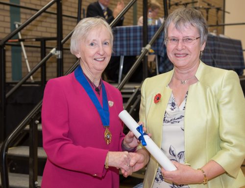 Sue Porter receives “The Scroll of Honour”